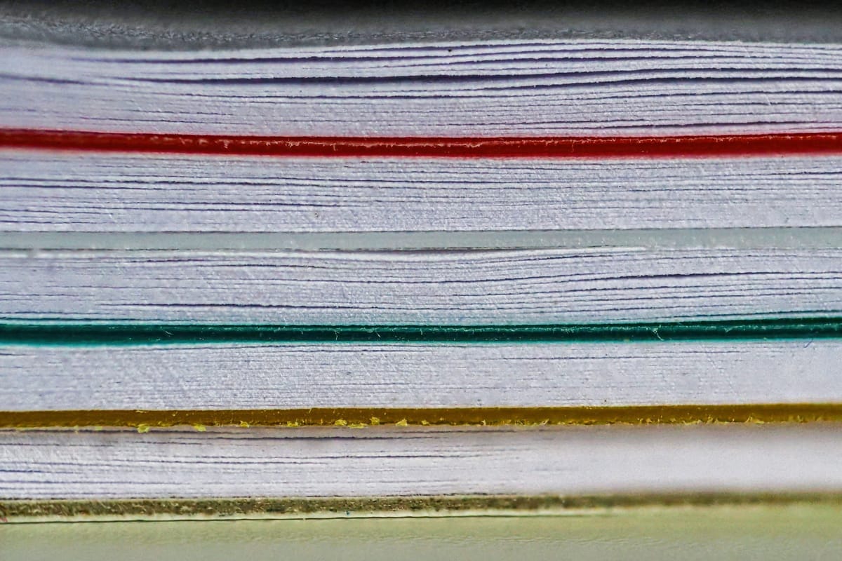 Unsplash editorial feature image for The Family-Service Documents Worth Organizing Before You Need Them; no readable text, logos, currency, personal data, or watermark; sharp topic...