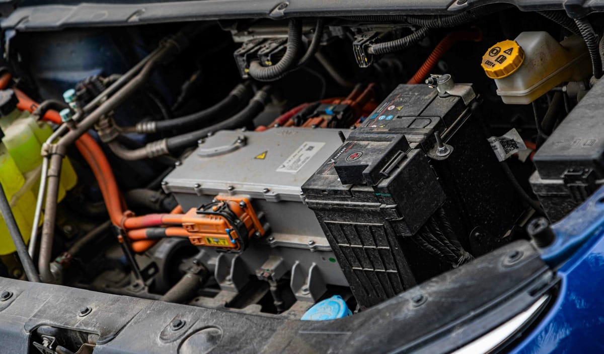 used EV purchase battery evidence; no visible faces; no readable logos or text; no plates; technical editorial image