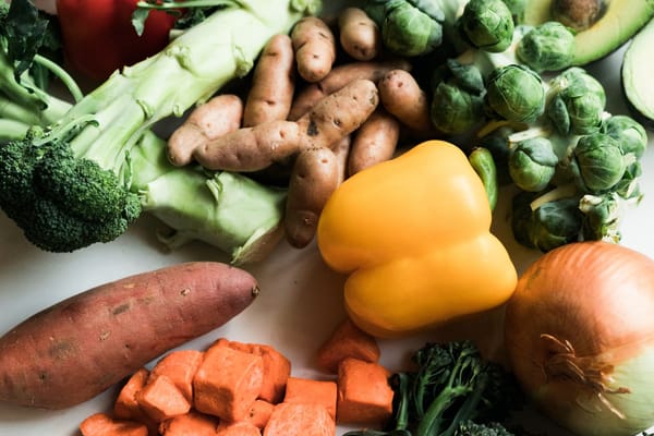 Colourful seasonal vegetables arranged as an abundant harvest still life