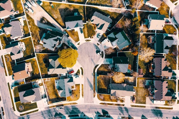 Unsplash editorial feature image for Before You Call a Housing Number a Market Signal, Check the Denominator; no readable text, logos, currency, personal data, or watermark; sharp topic...