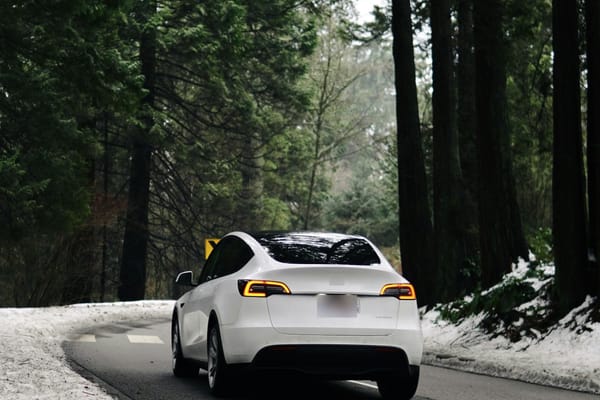 Unsplash editorial feature image for An EV Range Number Needs a Canadian Conditions Check; no readable text, logos, currency, personal data, or watermark; sharp topic relevance and...